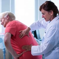 female-doctor-examining-patient-min (1)